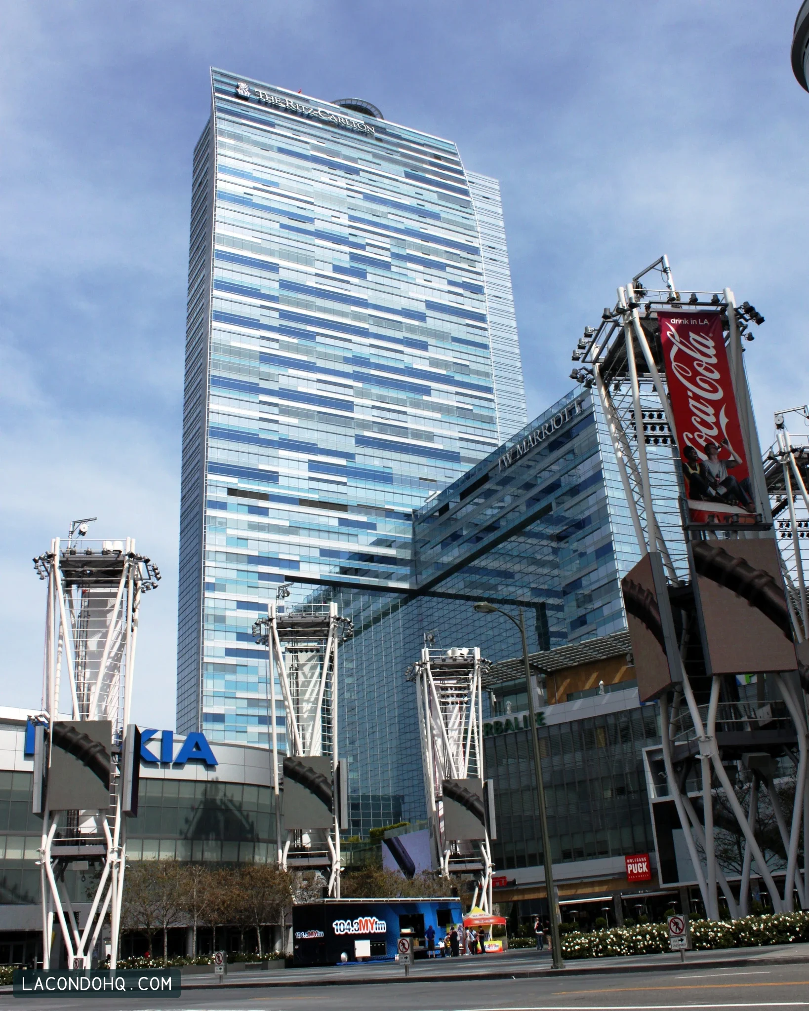 The Ritz-Carlton hotel and residences tower above the L.A. Live plaza in Downtown Los Angeles, photographed in April 2010. The residences occupy the tower's upper floors.