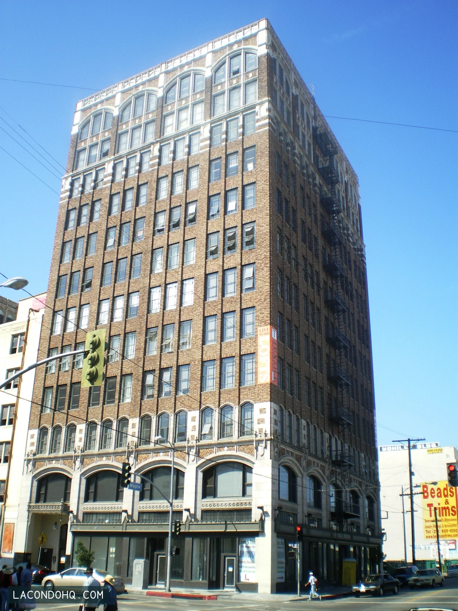 The Textile Center Building’s brick facade and arched upper windows at 315 East Eighth Street in Downtown Los Angeles, photographed in May 2008.